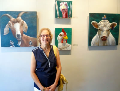 ART OF FOOD artist Judy Sherman with her paintings at URBAN GALLERY